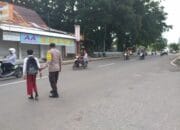 Personel Polsek Rasanae Timur Laksanakan Gatur Pagi untuk Kelancaran Lalu Lintas