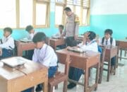 Bhabinkamtibmas Polres Bima Kota Bantu Pendistribusian Makan Bergizi Gratis (MBG) di Kecamatan Asakota