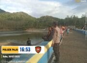 POLSEK PAJO AMANKAN LOMBA DAYUNG SAMPAN TRADISIONAL DI WADUK LA NANGGA