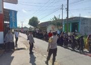 Sinergi TNI-Polri dan BKD Amankan Gerak Jalan HUT RI ke-80 di Desa Jelantik ‎