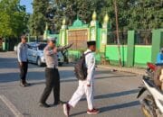 Anggota Lantas Polsek Rasanae Barat Polres Bima Kota Laksanakan Strong Point di Depan MTsN 1 Kota Bima