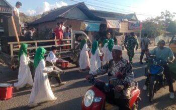 Bhabinkamtibmas Polsek Woha, Laksanakan Pengamanan Pawai Ta’aruf Pembukaan MTQ Tingkat Desa Samili ke-57